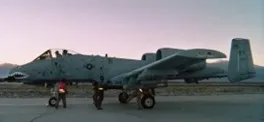 A military jet on the runway  